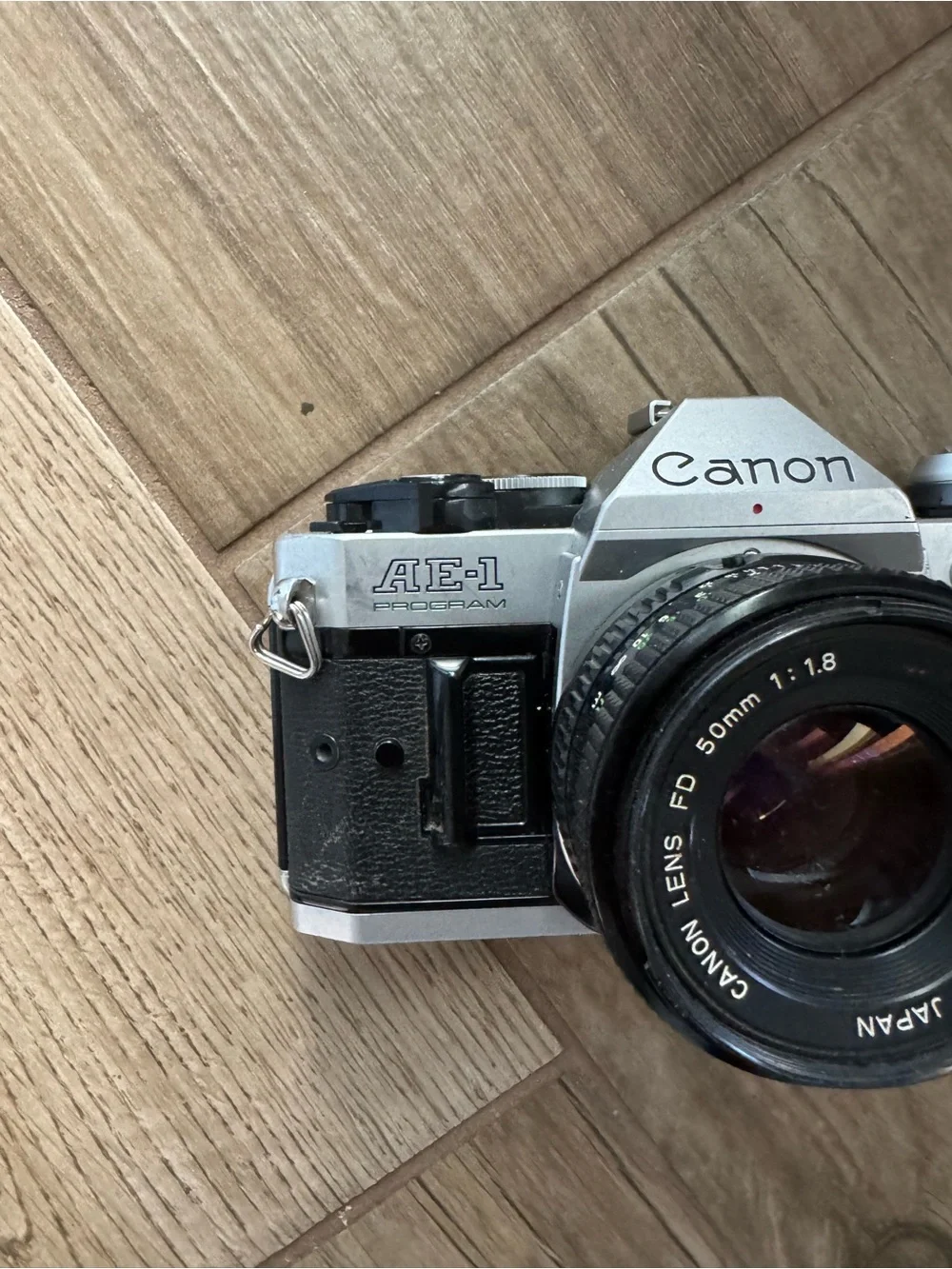 Canon AE-1 Program Film Camera in Black and Silver